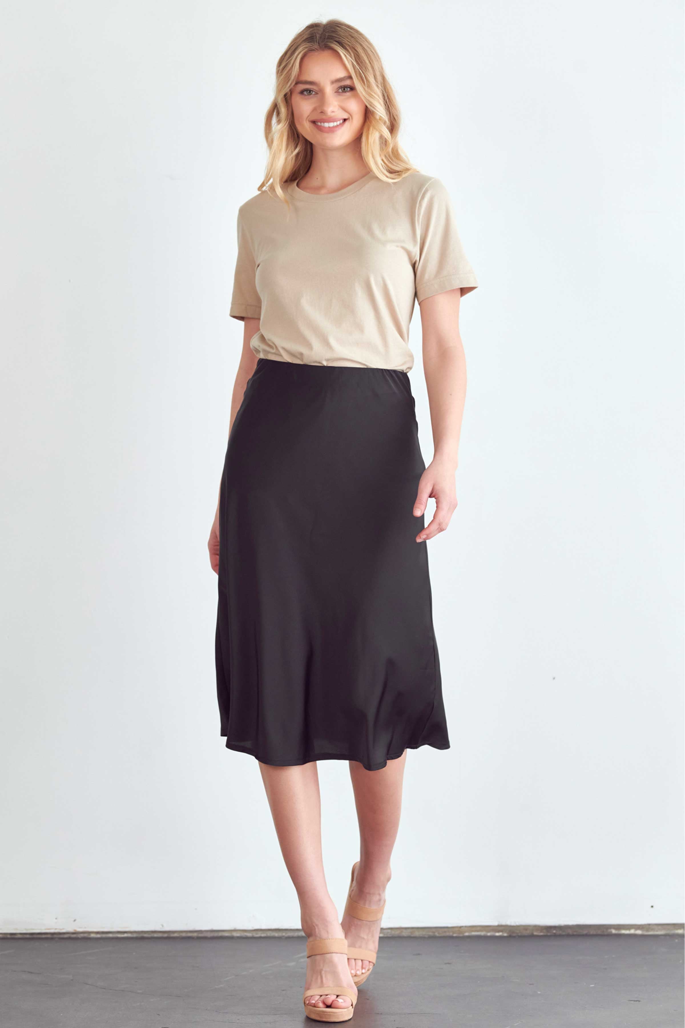 BLUME AND CO satin midi skirt for women in black styled with beige t-shirt and sandals