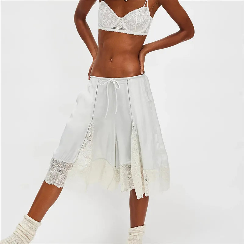 Women's white satin pajamas with lace trim for comfortable loungewear