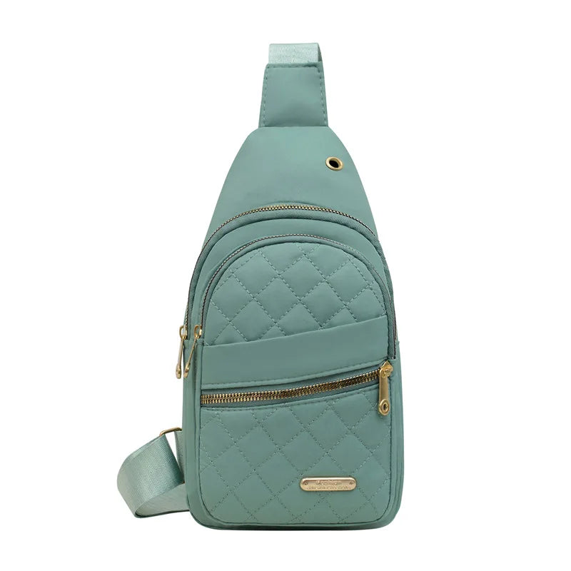 Teal quilted travel bag, durable material for quality travel bags.