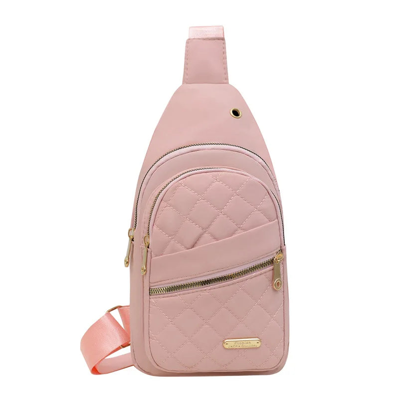 Pink quilted crossbody bag for stylish travel, quality travel bags