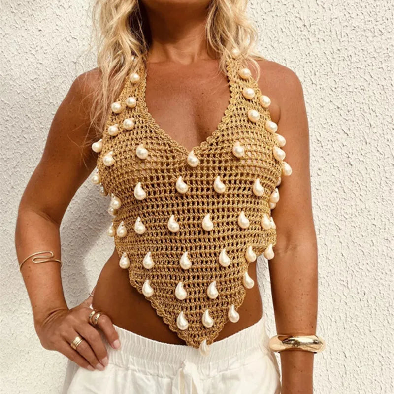 Women's sequin tank top in gold, stylish beachwear for summer.