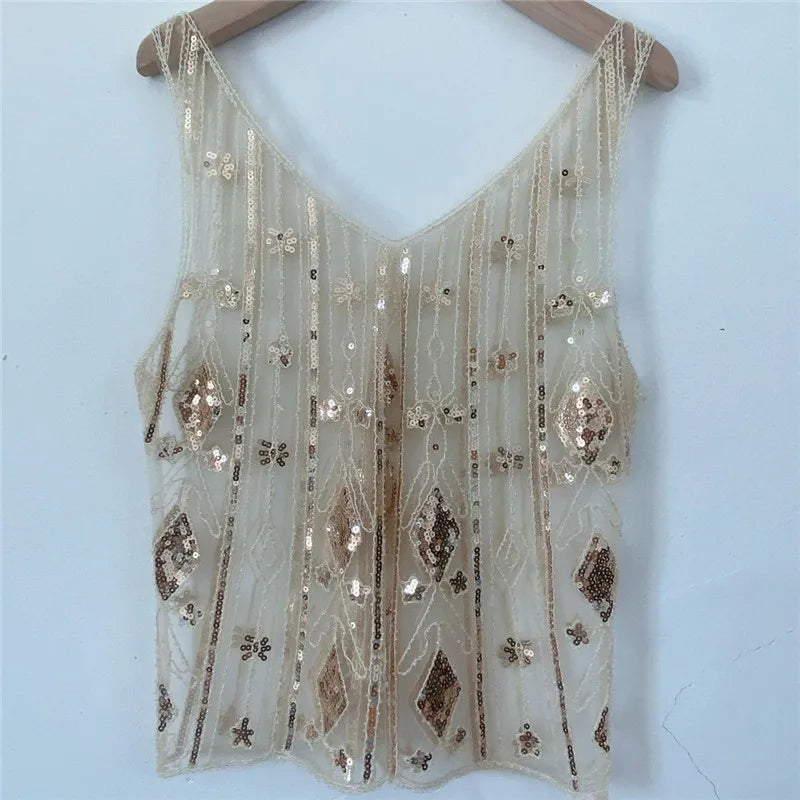 Women's sequin top in cream, perfect for evening events