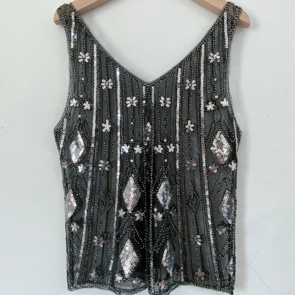 Women's sequin top in black, perfect for evening events