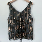 Women's black sequin top with intricate embroidery for festive occasions