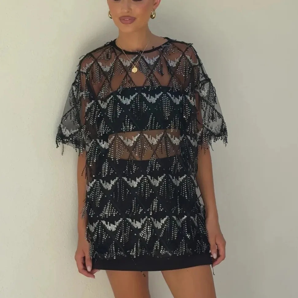 Women's black sequin top, stylish for evening events