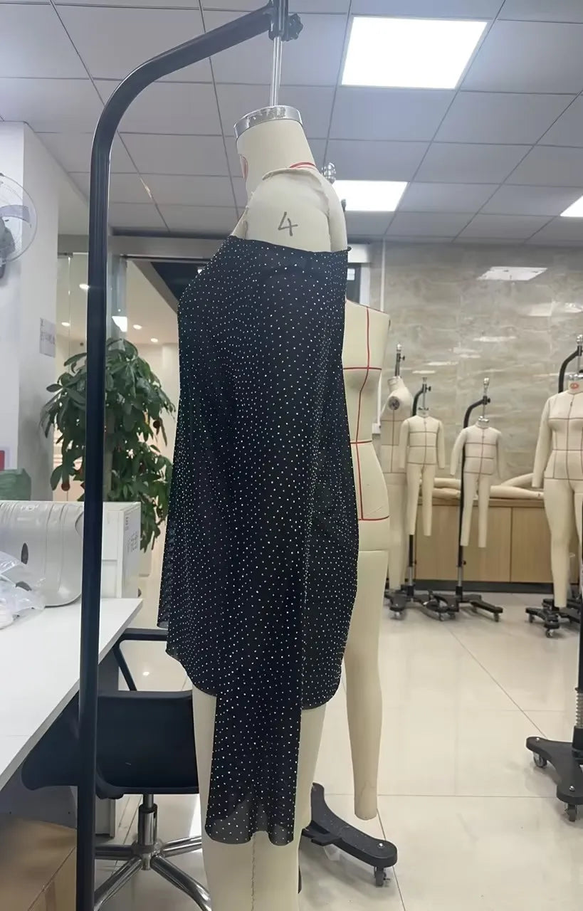 Black sequin top on mannequin, perfect for casual and party wear