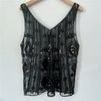 Women's black sequin top, perfect for evening wear