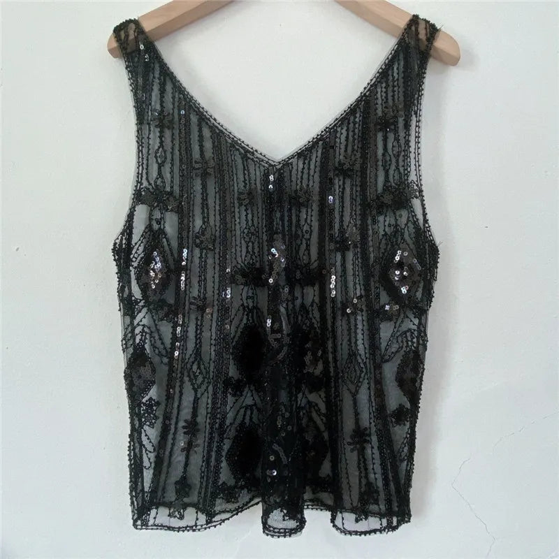 Women's black sequin top, perfect for evening wear
