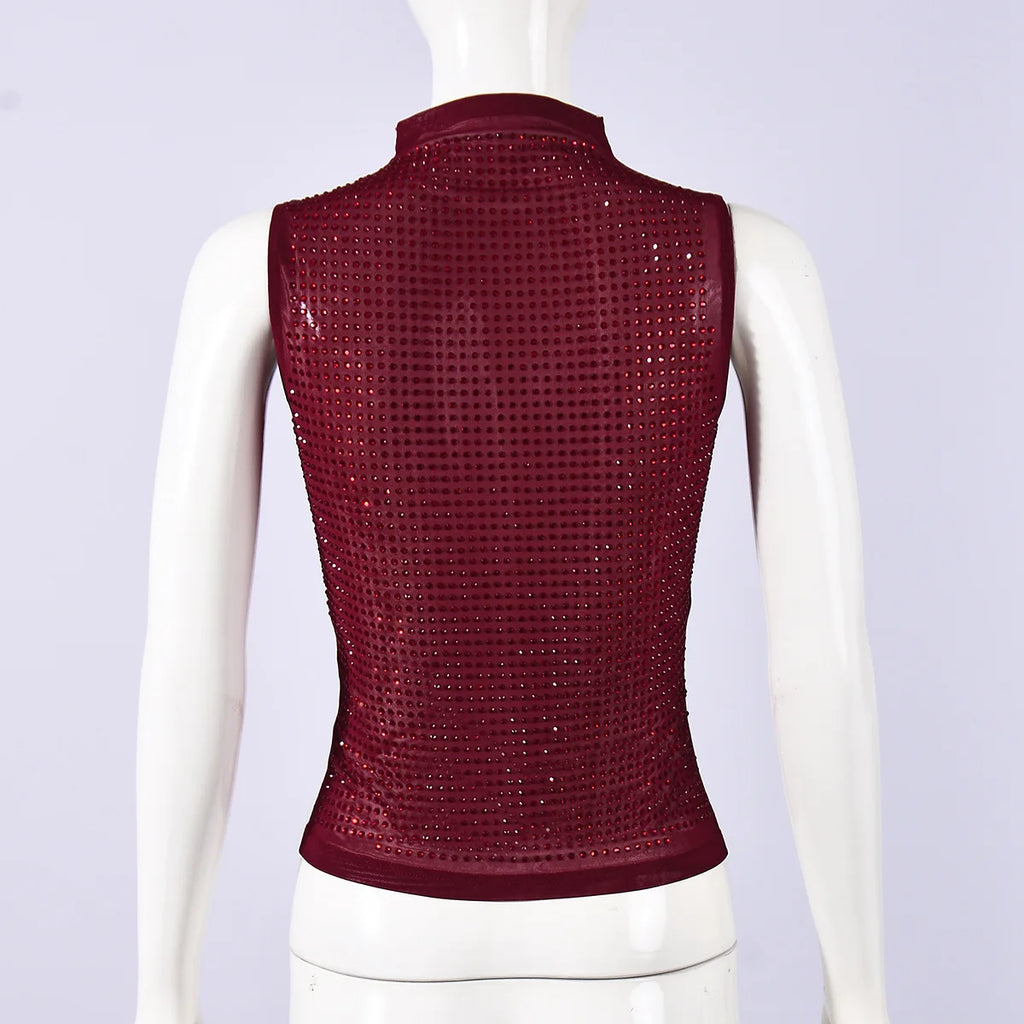 Burgundy sequin top with a fitted design for evening wear