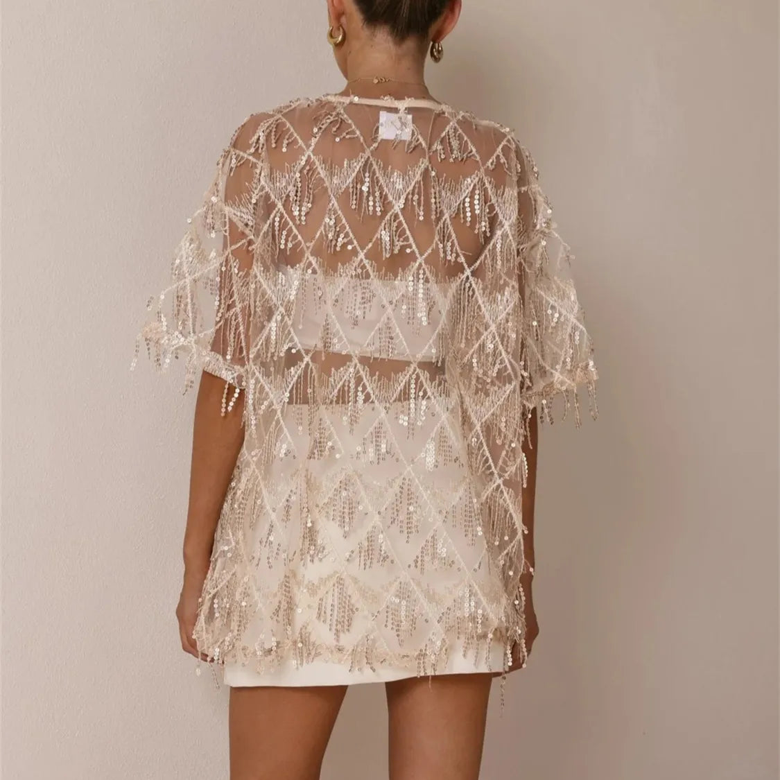 Women's sequin top, beige with sheer fabric, perfect for parties