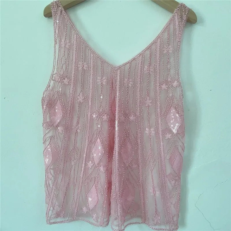 Women's pink sequin top, perfect for evening outings or parties