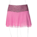Women's pink sequin top with sheer overlay for partywear