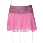 Women's pink sequin top with sheer overlay for partywear