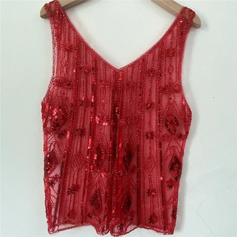 Women's red sequin top, perfect for festive occasions