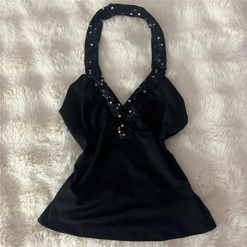 Women's black sequined top, perfect for a night out
