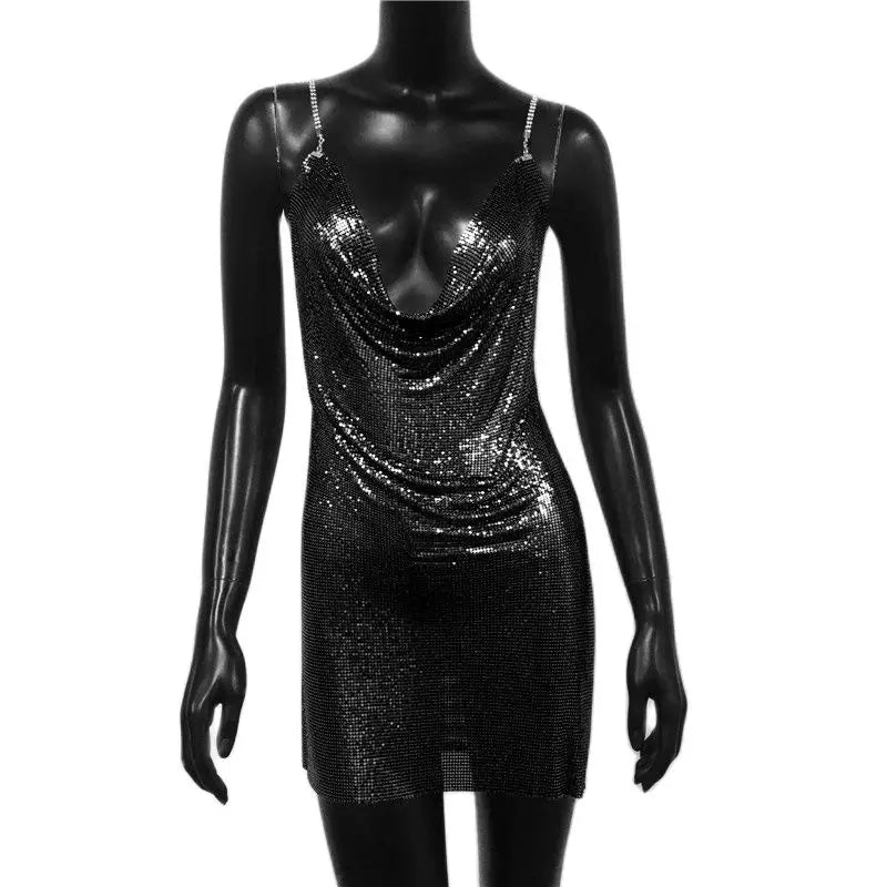 Black shiny sexy backless party dress for women with thin straps on mannequin