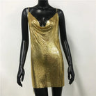 Gold chainmail sexy backless party dress for women with thin straps on mannequin