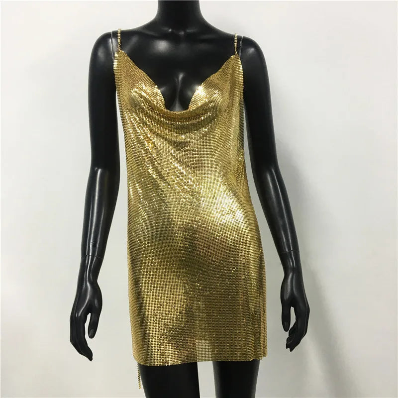 Gold chainmail sexy backless party dress for women with thin straps on mannequin