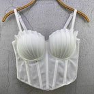 White sexy party club bustier top with structured cups and adjustable straps hanging on wooden hanger
