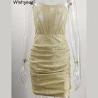 Shimmery gold sleeveless sexy ruched bodycon club dress displayed on clear mannequin