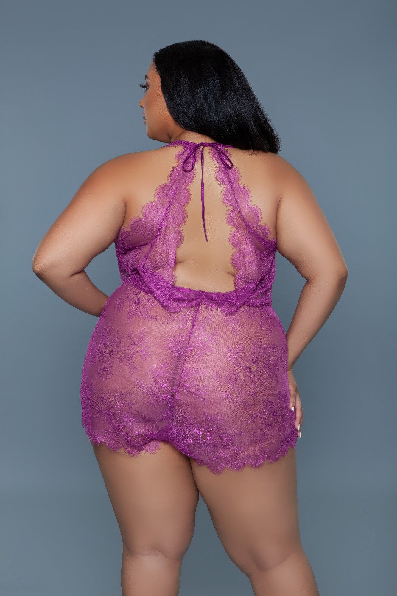 Purple sexy vacation romper with open back and lace details, perfect for summer wear