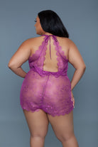 Purple sexy vacation romper with open back and lace details, perfect for summer wear