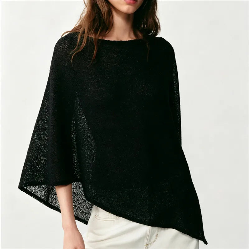 Black shawl wrap made of lightweight fabric, perfect for layering