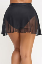 Black sheer high waisted bikini bottoms cover up for a stylish beach look by VacationGrabs