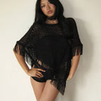 Black sheer poncho with fringed edges for beach outings