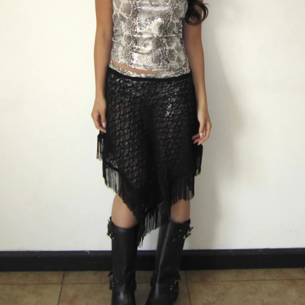 Black sheer poncho with fringe, perfect for stylish layering