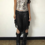 Black sheer poncho with fringe, perfect for stylish layering