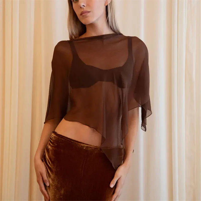 Women's sheer poncho in brown, perfect for layering over outfits