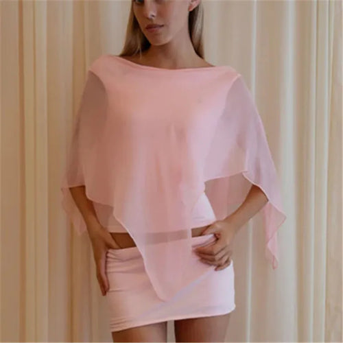 Women's sheer poncho in soft pink, perfect for beach cover-up