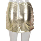 Gold shiny puffer skirt by Red Iphigenia with ruched detailing and back zip closure