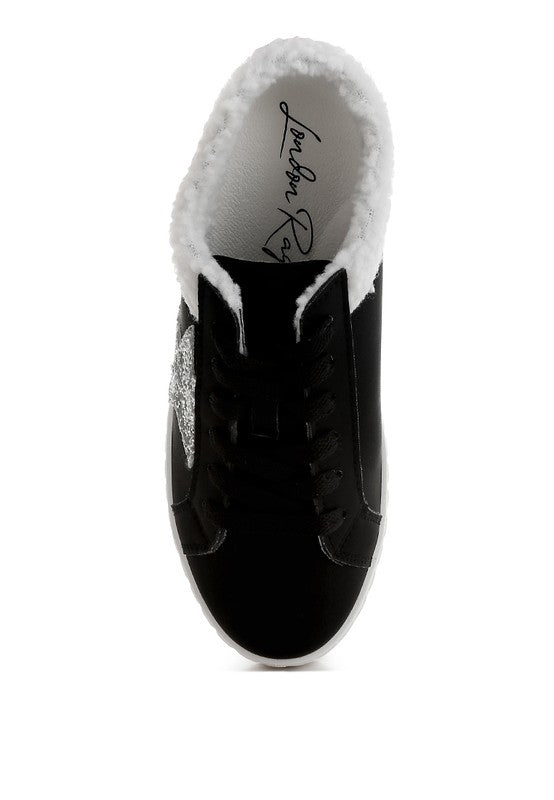Women's black sneakers with soft lining, perfect for casual outings
