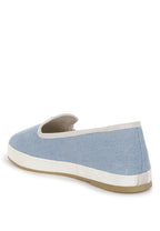 Women's blue sneakers made from canvas, perfect for casual wear