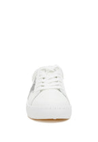 Women's white sneakers by Rag Company with sparkly accents for casual wear