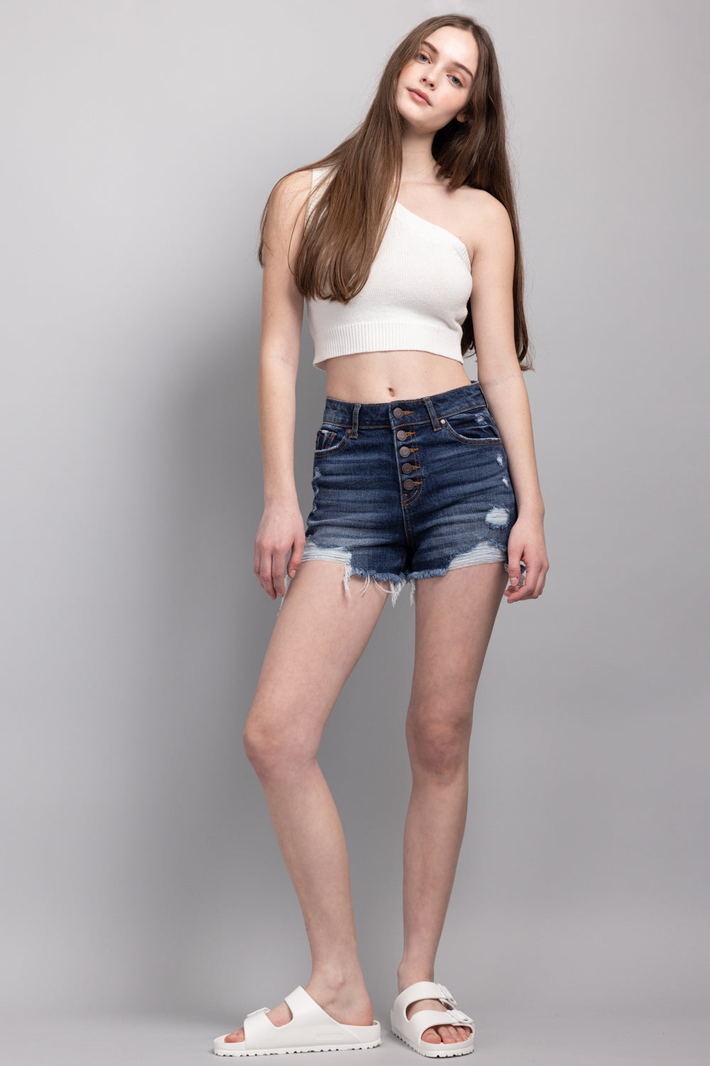 Women's distressed dark denim shorts for casual summer outfits