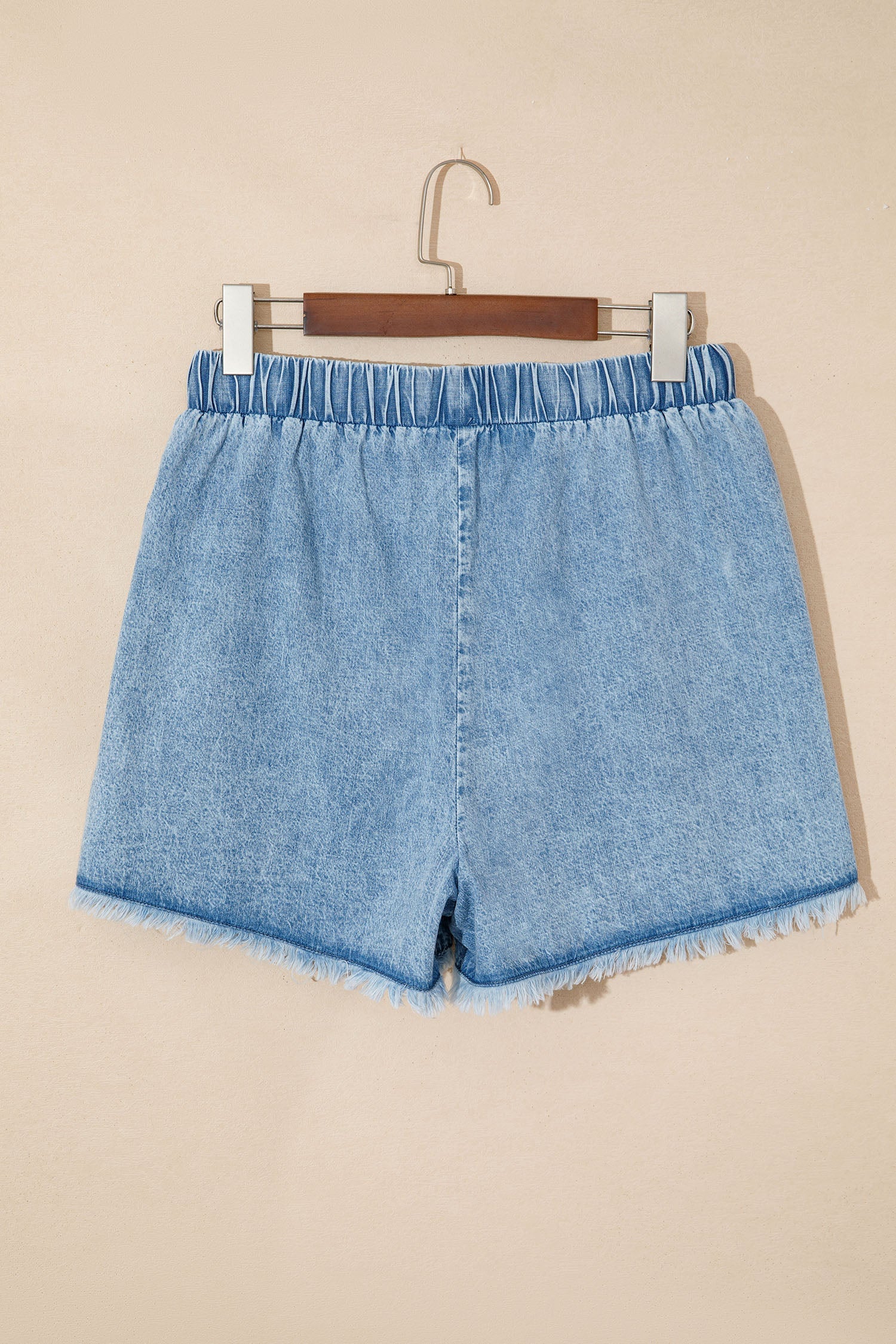 Women's relaxed fit shorts in denim, perfect for casual summer outings