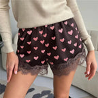 Women's black shorts with lace and pink heart print for casual wear
