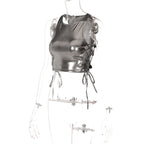 Side tie metallic tank top in shiny silver with lace-up detailing on a transparent mannequin