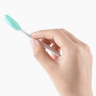 Silicone face brush for blackheads, mint color, gentle exfoliation tool