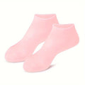 Pink silicone moisturizing foot socks for soft, hydrated feet
