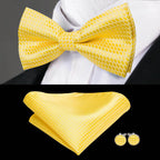 Yellow silk bow ties for men with matching pocket square and cufflinks