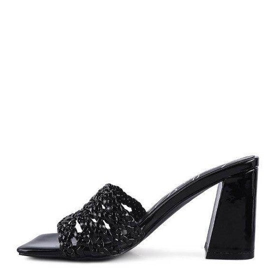Stylish black women's heels with a braided design, perfect for fashionable outfits