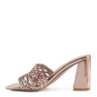 Stylish silver braided slider sandals with a high block heel for a chic look
