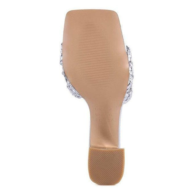 Sole of silver braided slider sandals from Rag Company with a textured bottom for better grip