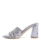 Stylish silver braided slider sandals with a chunky heel for a chic summer look