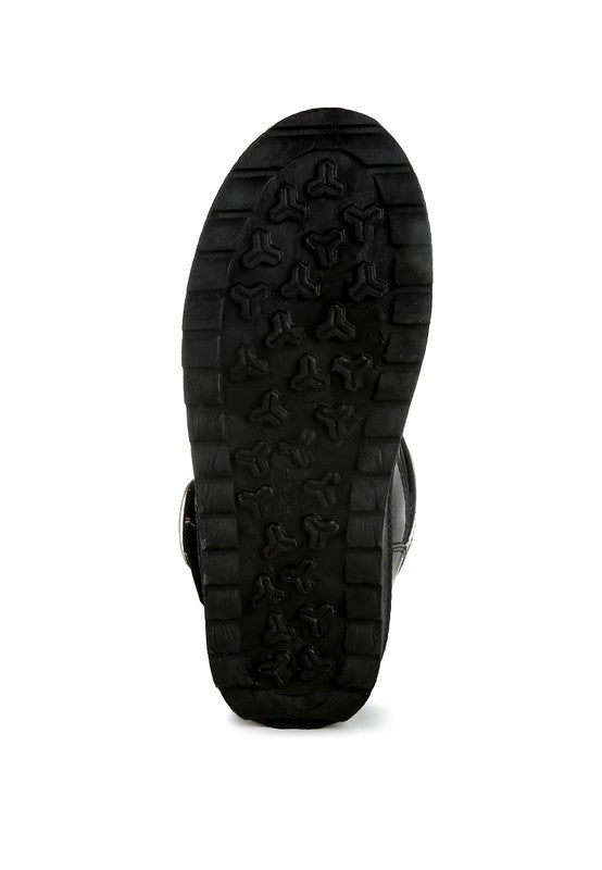 Sole of Rag Company women's silver buckle strap boots with textured grip for better traction