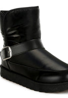 Black ankle boots with a silver buckle strap, perfect for stylish women's footwear